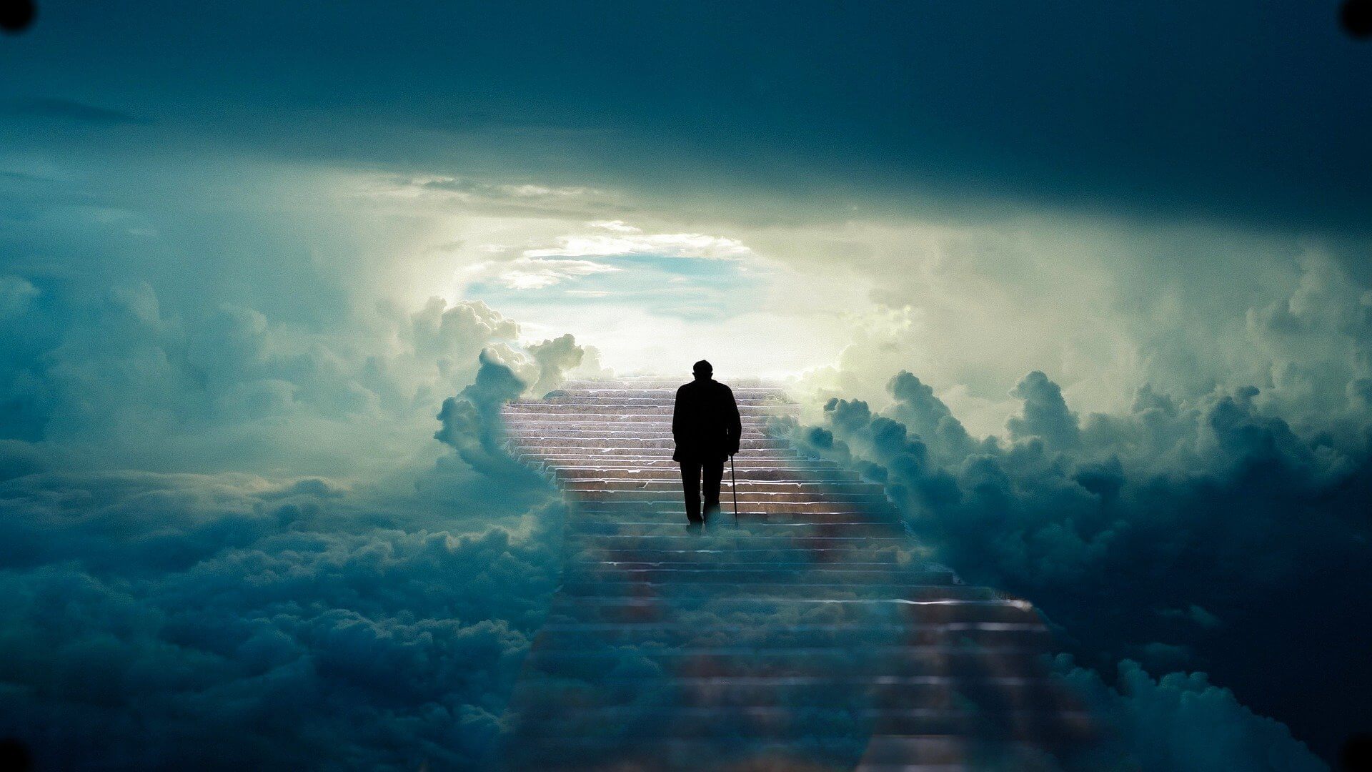 Mann auf Treppe in den Himmel